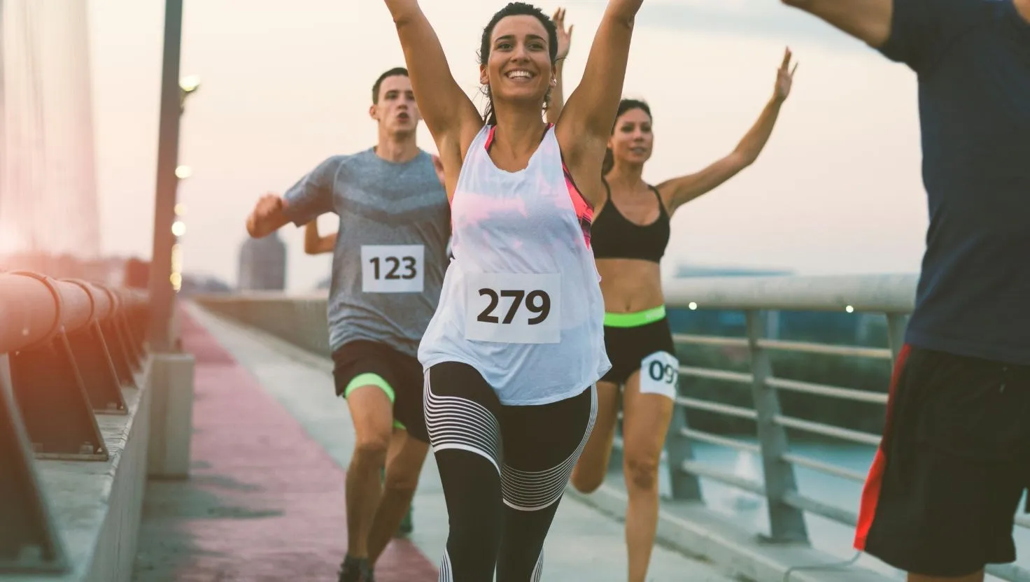 Runners with race numbers taking part in a marathon